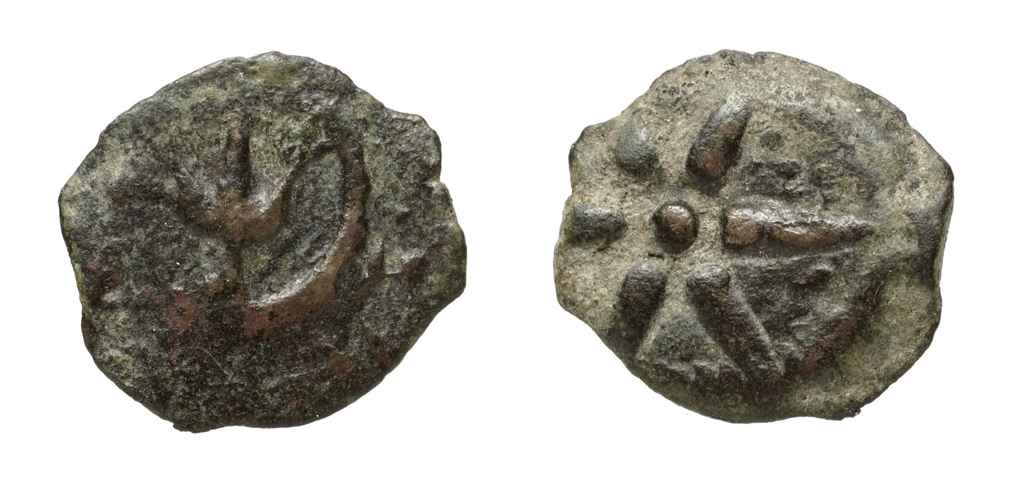 Bronze prutah of Alexander Jannaeus — anchor on the obverse, eight-rayed star with paleo-Hebrew legend on the reverse