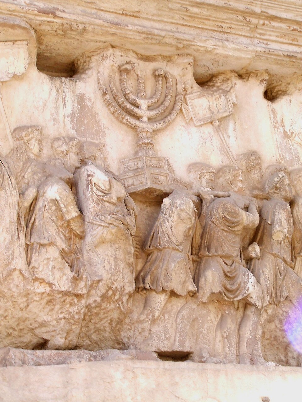 Relief inside the Arch of Titus: Roman soldiers carry the menorah and other spoils from the Jerusalem Temple.