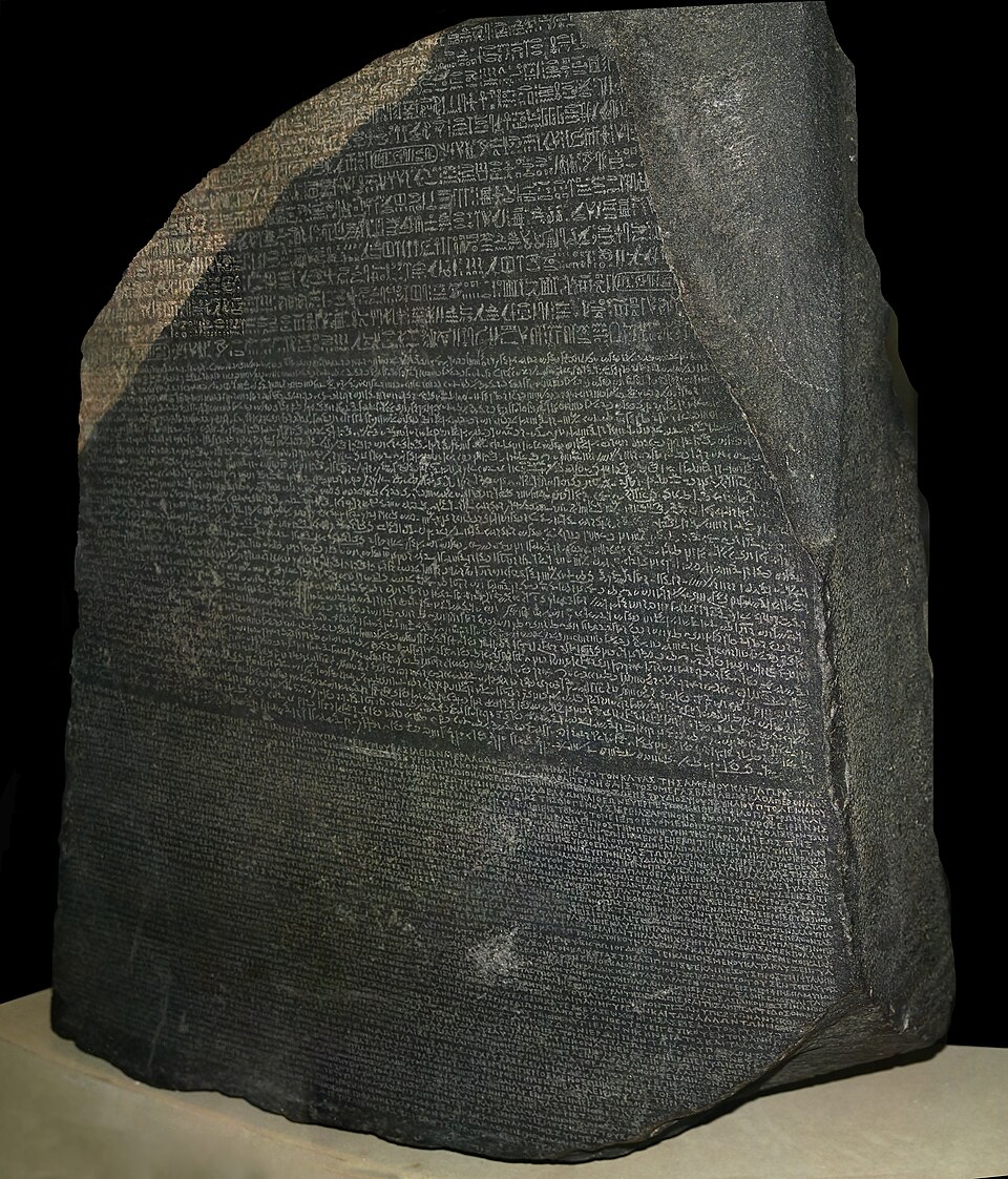The Rosetta Stone, inscribed with a decree of Ptolemy V in hieroglyphic, Demotic and Greek.